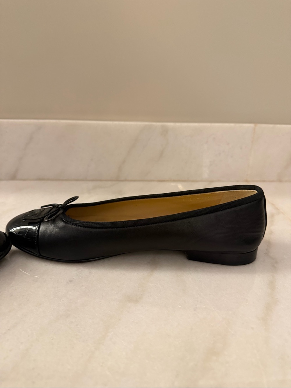 CHANEL Black Leather Ballet Flats with Patent Cap Toe and Bow - Picture 9 of 11